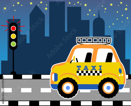 Yellow taxi cartoon in the road at night on buildings background