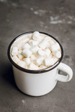 Sweet hot chocolate in mug. Christmas drink with marshmallow. Selective focus. Shallow depth of field. 