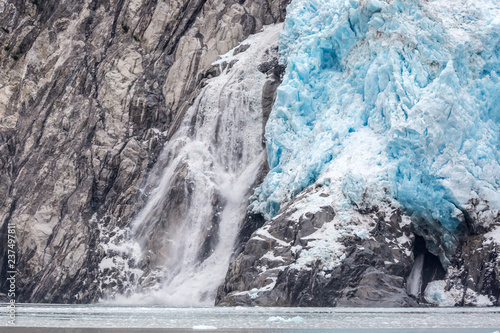 A glacier with blue ice in Kenai Fjords National Park in Alaska. 