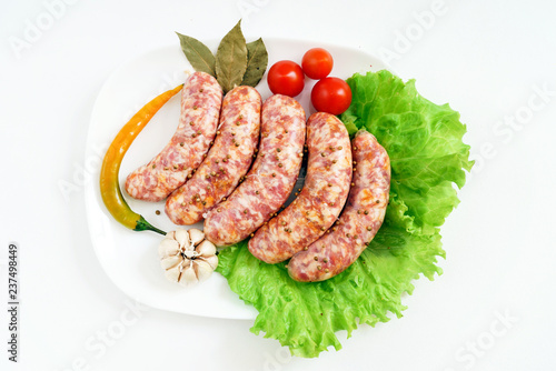 raw sausages with spice