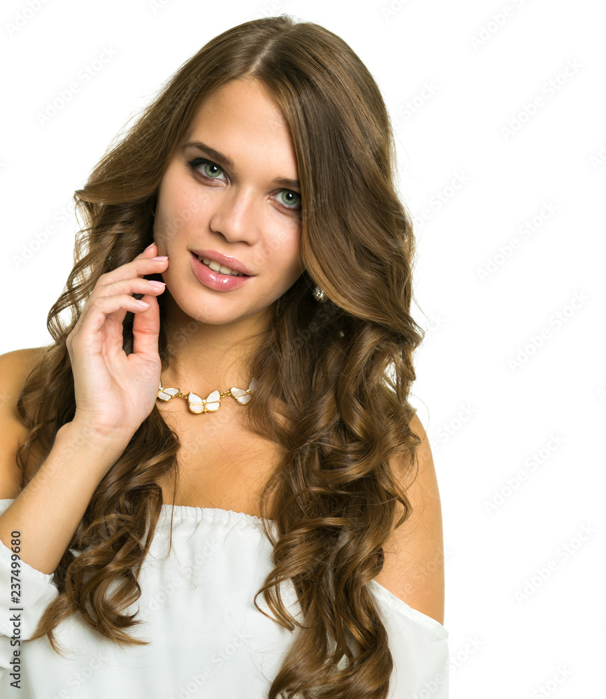 Portrait of a young beautiful girl in a blouse with open shoulders Portrait of a young beautiful girl in a blouse with open shoulders