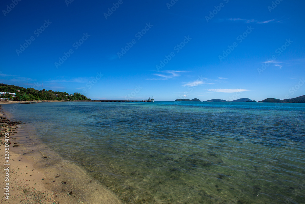 Background of the sea, blue sky wallpaper, the beauty of nature in bright weather, green water looks refreshing. Background of the sea, blue sky wallpaper, the beauty of nature in bright weather, green water looks refreshing.