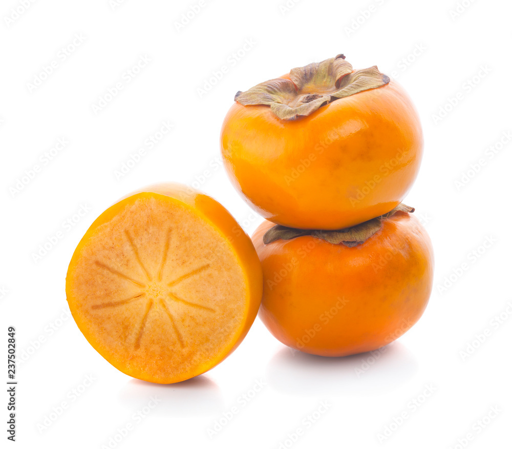 Tropical fruit persimmon. Kaki with leaves on white background. Tropical fruit persimmon. Kaki with leaves on white background.