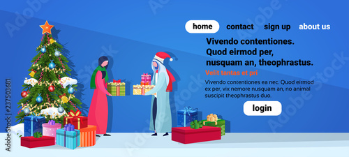 arabic couple giving present each other happy new year merry christmas concept flat fir tree decoration blue background full length horizontal copy space