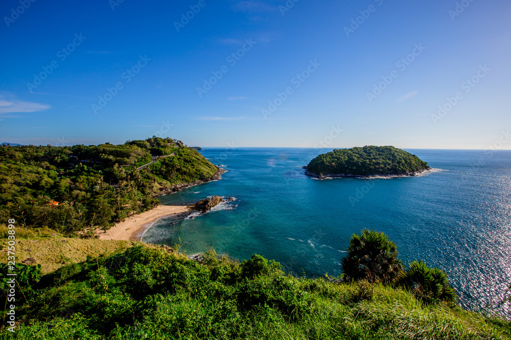 Fototapeta premium Promthep Cape, Phuket is one of the most beautiful scenic spots in Phuket, with a wide range of tourists, scenic mountains, sea and blue sky.
