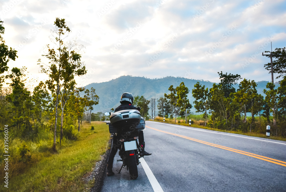 man travel by motorcycle,biker and landscape man travel by motorcycle,biker and landscape