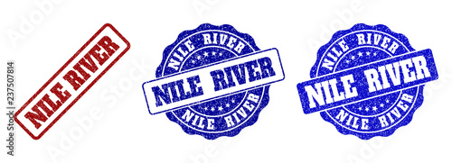 NILE RIVER grunge stamp seals in red and blue colors. Vector NILE RIVER marks with grunge style. Graphic elements are rounded rectangles, rosettes, circles and text captions.