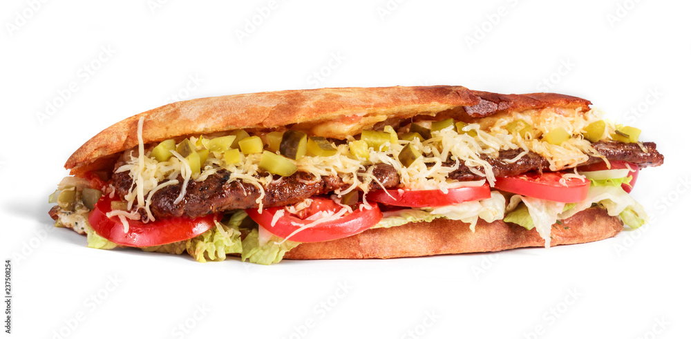 Sandwich from fresh pita bread with fillet grilled beef, lettuce, slices of fresh tomatoes, pickles and cheese on white background Sandwich from fresh pita bread with fillet grilled beef, lettuce, slices of fresh tomatoes, pickles and cheese on white background