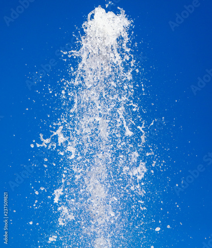 Splashes of water against the blue sky