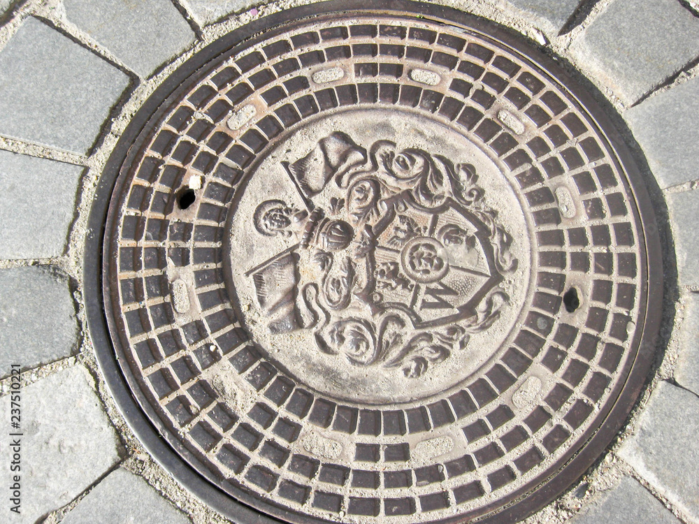 old manhole cover