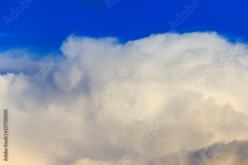 Clouds after rain before sunset as a background