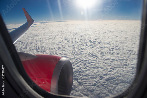 Look at the clouds from the plane window.
