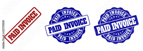 PAID INVOICE grunge stamp seals in red and blue colors. Vector PAID INVOICE labels with scratced style. Graphic elements are rounded rectangles, rosettes, circles and text labels.