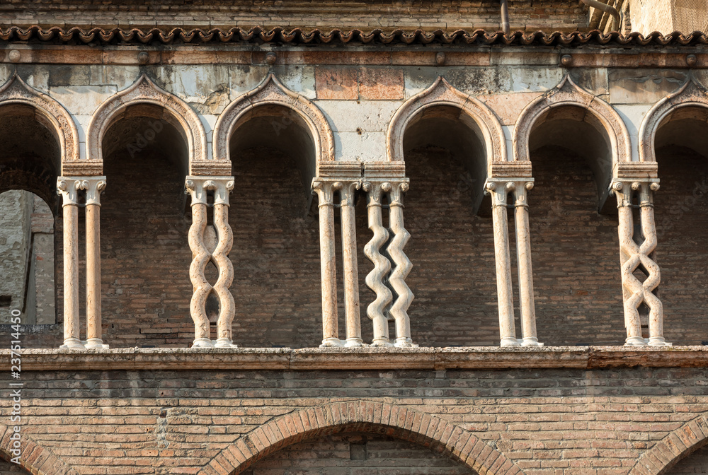  the side wall of Ferrara cathedral, Basilica Cattedrale di San Giorgio, Ferrara, Italy