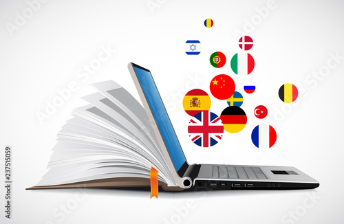 Laptop and book as online dictionary - e-learning online language learning system 