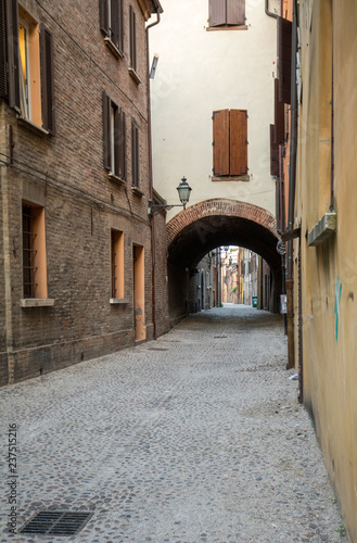 Fototapeta Naklejka Na Ścianę i Meble -  Via delle Volte of Ferrara in the medieval quarter. Emilia-Romagna. Italy.