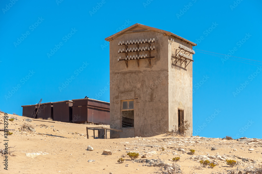 Kolmanskuppe, aslo known as Kolmanskop, a diamond mining ghost town on the Skeleton Coast of Namibia. Kolmanskuppe, aslo known as Kolmanskop, a diamond mining ghost town on the Skeleton Coast of Namibia.
