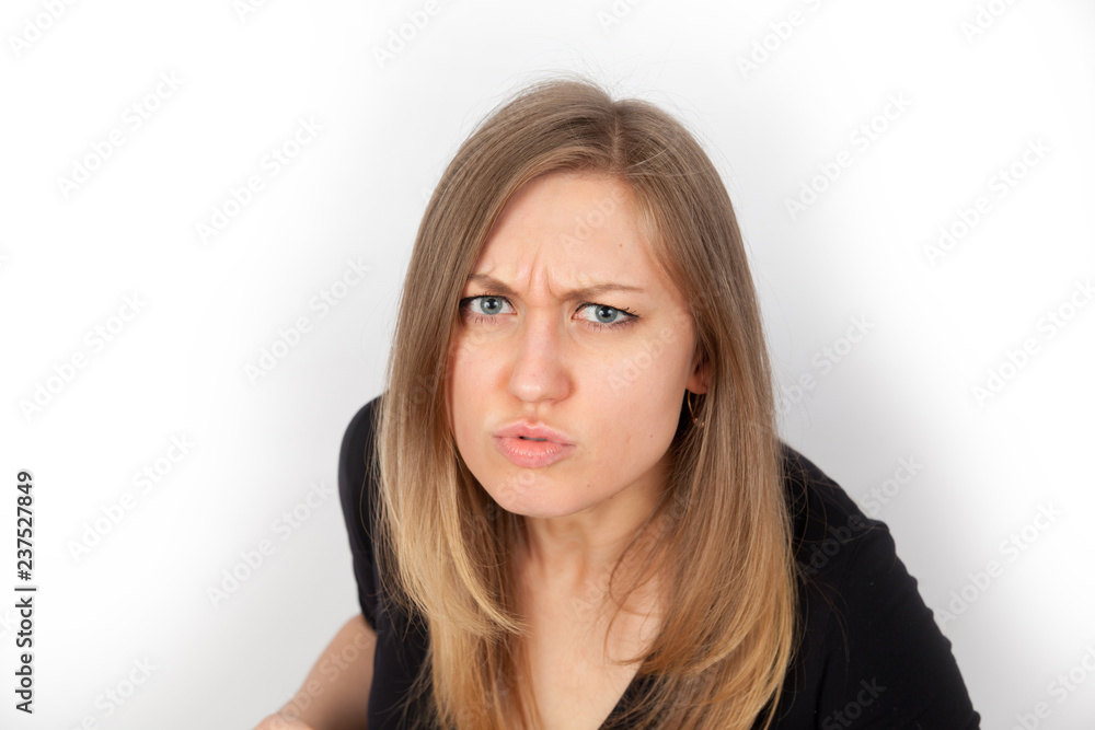 portrait of beautiful angry woman on white background portrait of beautiful angry woman on white background