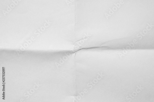 White sheet of paper folded texture photo