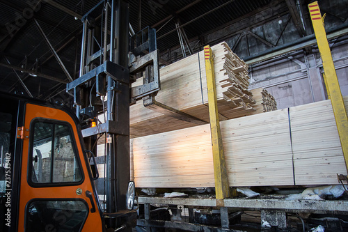 folk lift truck in wood factory or forestry timber depot