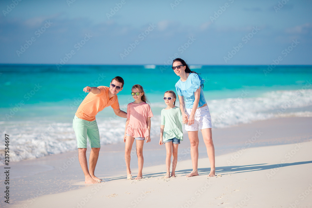 Young family with two kids on beach vacation Young family with two kids on beach vacation