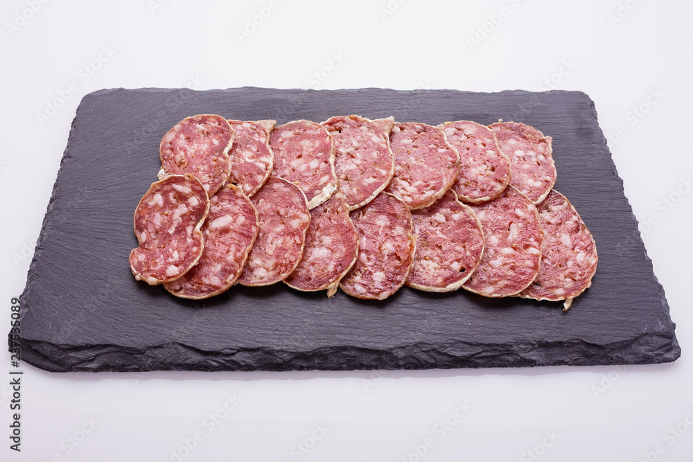 Saucisson sec delicious french salami on a white background Saucisson sec delicious french salami on a white background