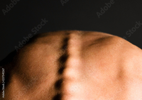 Fragment of a female back