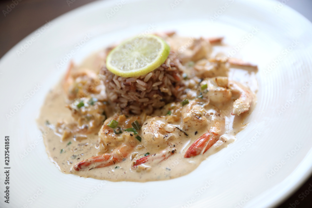 Grilled prawns shrimps with garlic, lemon and spices with rice Grilled prawns shrimps with garlic, lemon and spices with rice