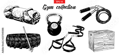 Vector engraved style illustrations for posters, logo, emblem and badge. Hand drawn sketch set of gym and fitness equipment, weight, sandbag, training tire and hummer. Detailed vintage etching drawing
