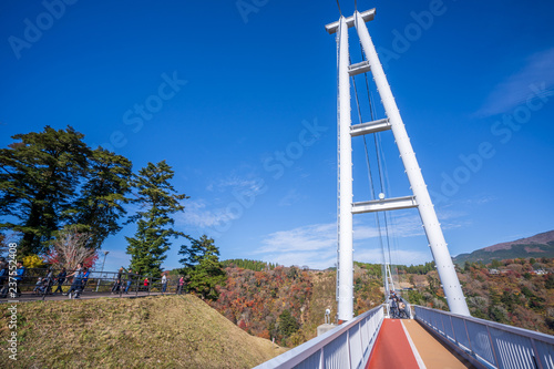 Kuju, oita, Japan, November 11, 2018: Kokonoe Yume Suspension Bridge (otsurihashi), the most highest suspension bridge for walkway in Japan. photo