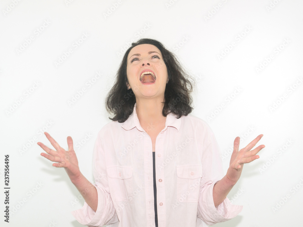 portrait of an angry woman over white background portrait of an angry woman over white background