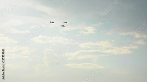 Three planes flying in the sky