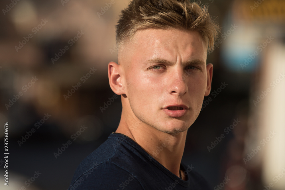 Looking amazing as a muscular man. Caucasian man wear casual fashion clothes. Muscular fashion model. Handsome man with fashionable haircut. Athletic healthy man. His body deserves to show it off Looking amazing as a muscular man. Caucasian man wear casual fashion clothes. Muscular fashion model. Handsome man with fashionable haircut. Athletic healthy man. His body deserves to show it off