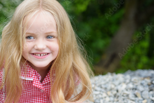 Just feeling completely happy. Little girl wear long hair. Small girl with blond hair. Happy little child with adorable smile. Small child happy smiling. Let my hair down