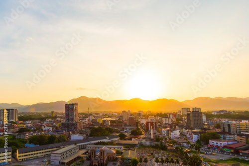 Aerial View of Ipoh ,Malaysia during sunset. soft focus,blur due to long exposure. visible noise due to high ISO.