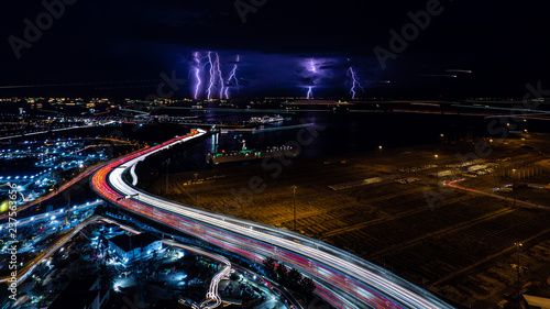 Beautiful Lightning and light trails in highway at Singapore