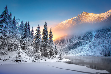 Winter mountain landscape at sunrise