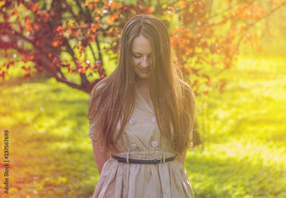 Beautiful girl in the summer park. Smiling Beautiful girl in the summer park. Smiling