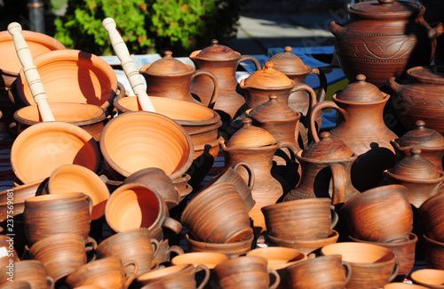 Traditional clay dish. Showcase of handmade ceramic pottery. © bildlove