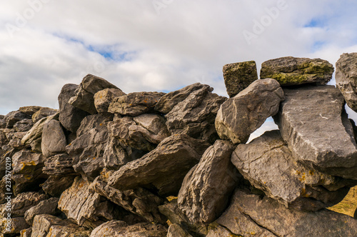 A typical dry stone wall on the irish countryside. Famine Walls in Burren, County Clare, Ireland.