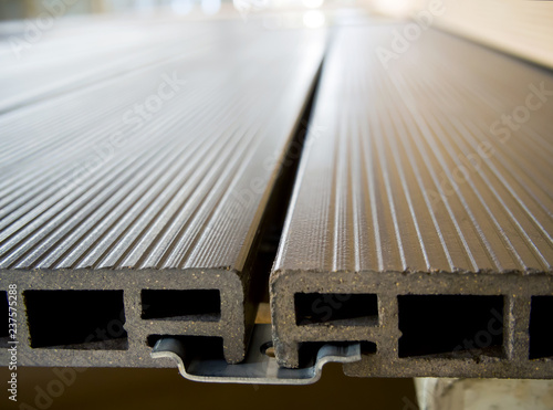 Принти на полотні The terrace board from a polymeric composite fastened by a metal collar