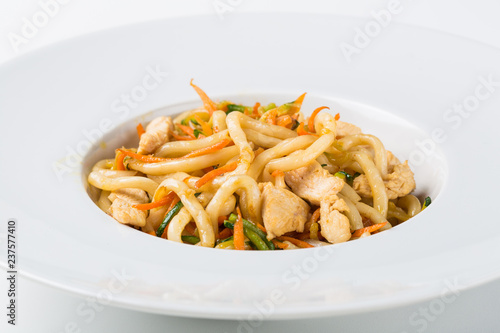 Asian noodles with chicken or pork and vegetables
