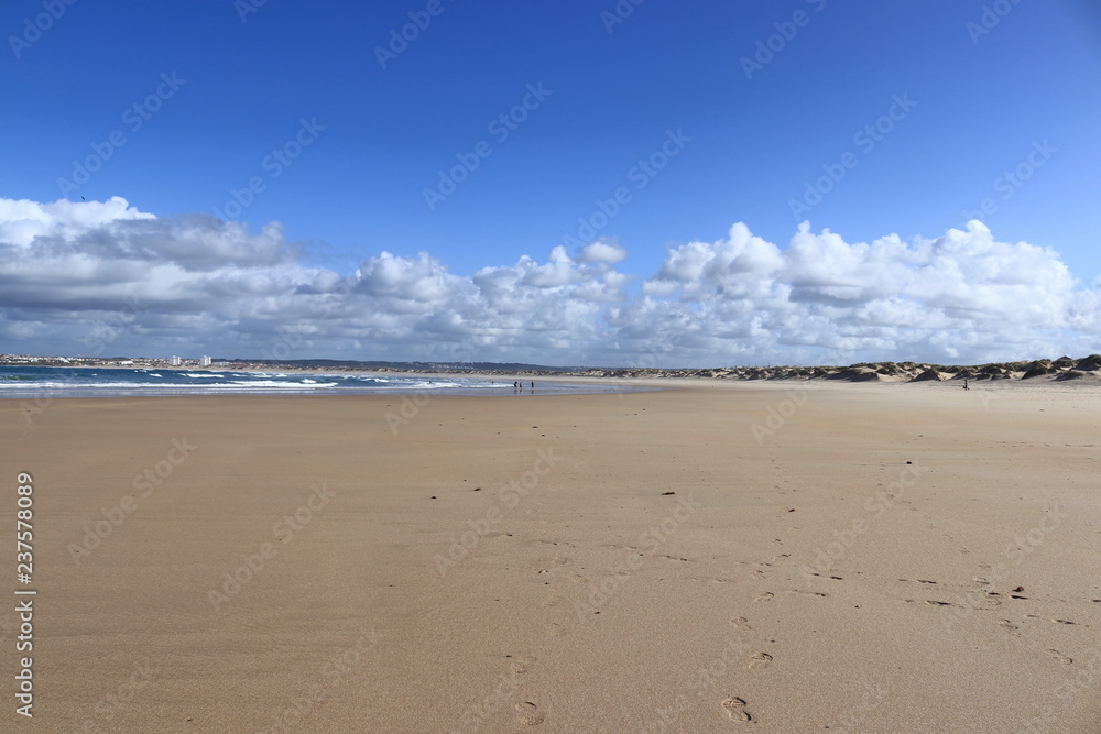 sand sea with people in background and sky with white clouds, Gamboa Beach sand sea with people in background and sky with white clouds, Gamboa Beach