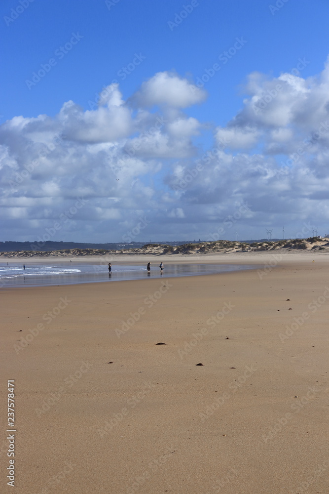 blue sky and clouds in the background, sand and people, Peniche blue sky and clouds in the background, sand and people, Peniche