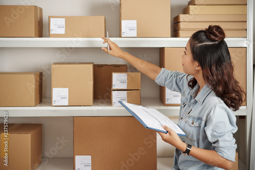 Checking parcels on shelves photo