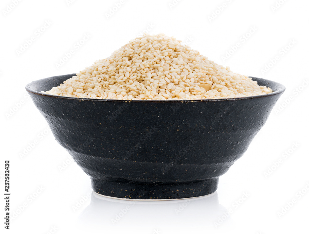 white sesame seed in bowl on white background white sesame seed in bowl on white background