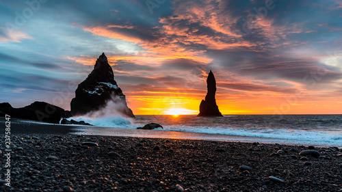 Reynisdrangar seen from Reynisfjara (the black Beach) on Iceland at sunrise