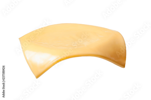 Yellow cheese slices isolated on white background.