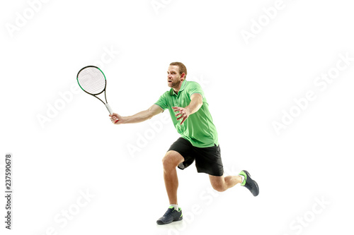 The one caucasian man playing tennis isolated on white background. Studio shot of fit young player at studio in motion or movement during sport game.. © master1305
