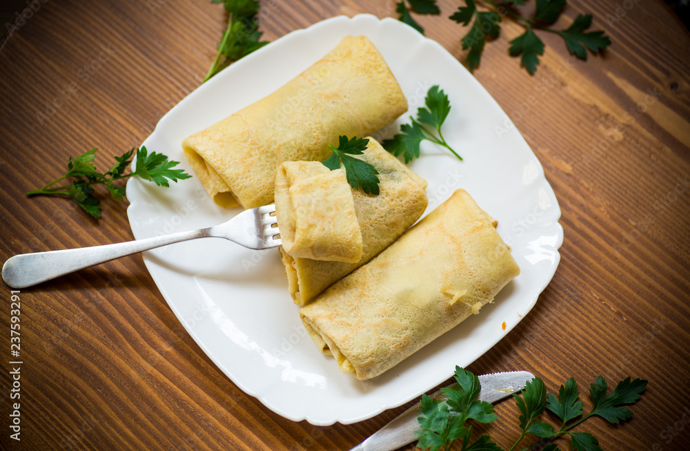 thin fried pancakes stuffed with stewed cabbage